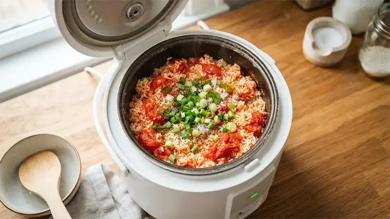 One-pot tomato rice recipe made in a rice cooker